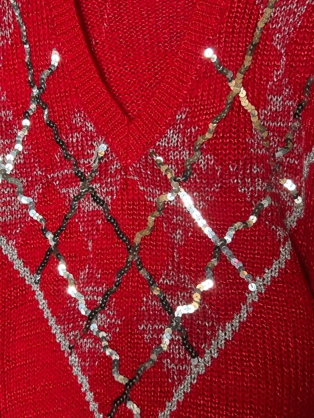 Women’s vintage Andene sweater features a festive red knit. Rarely Worn